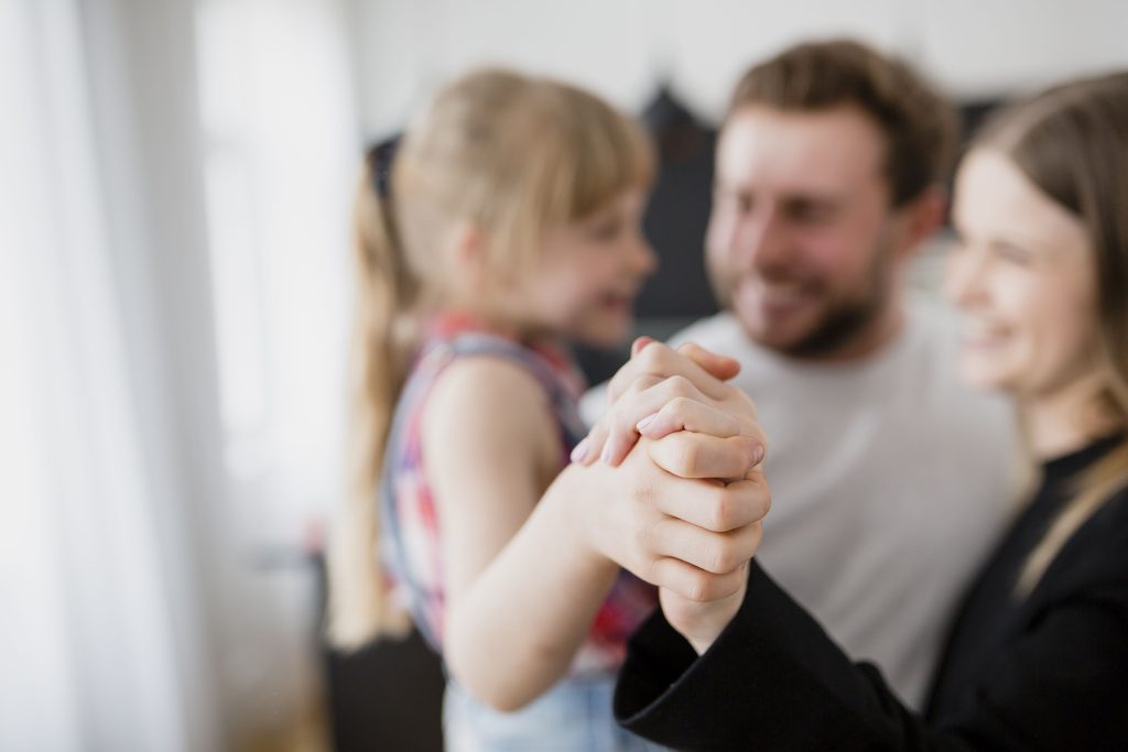 blurred family hugging each other